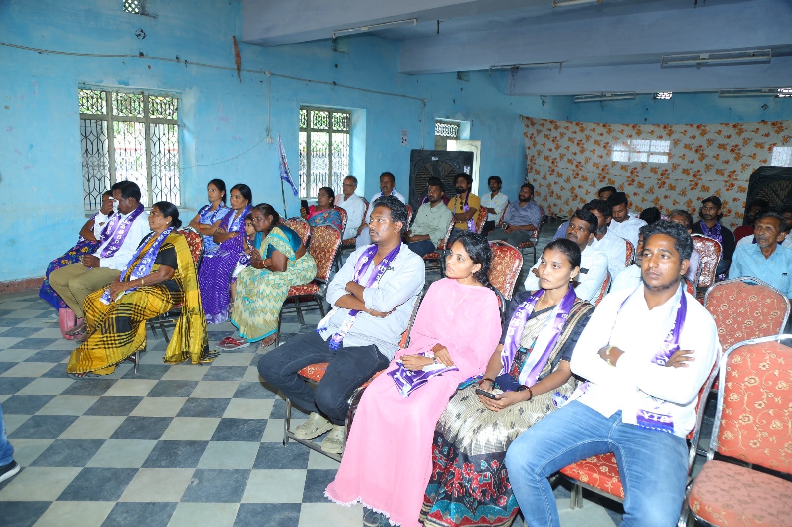 Yuva Taram Party leaders seated at a public meeting